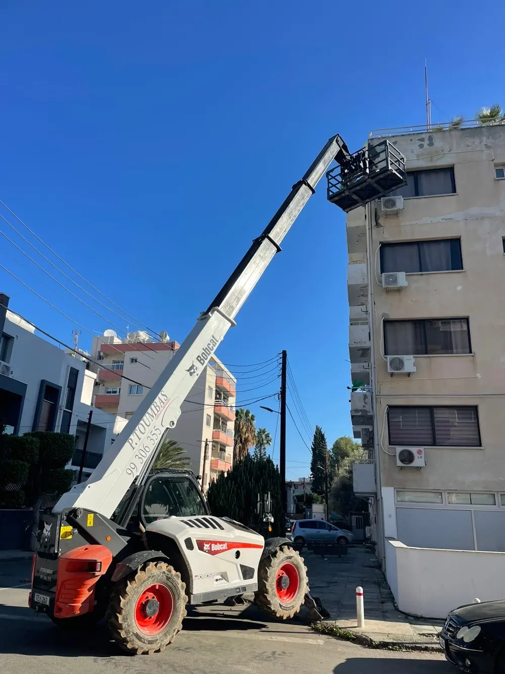 P.TOUMBAS forklift on a narrow Limassol street