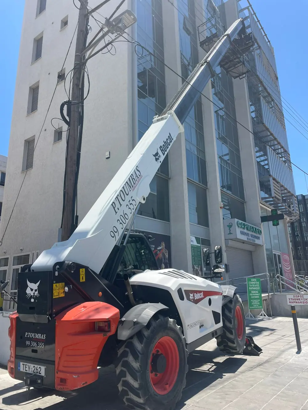 Telescopic forklift at a commercial building in Limassol