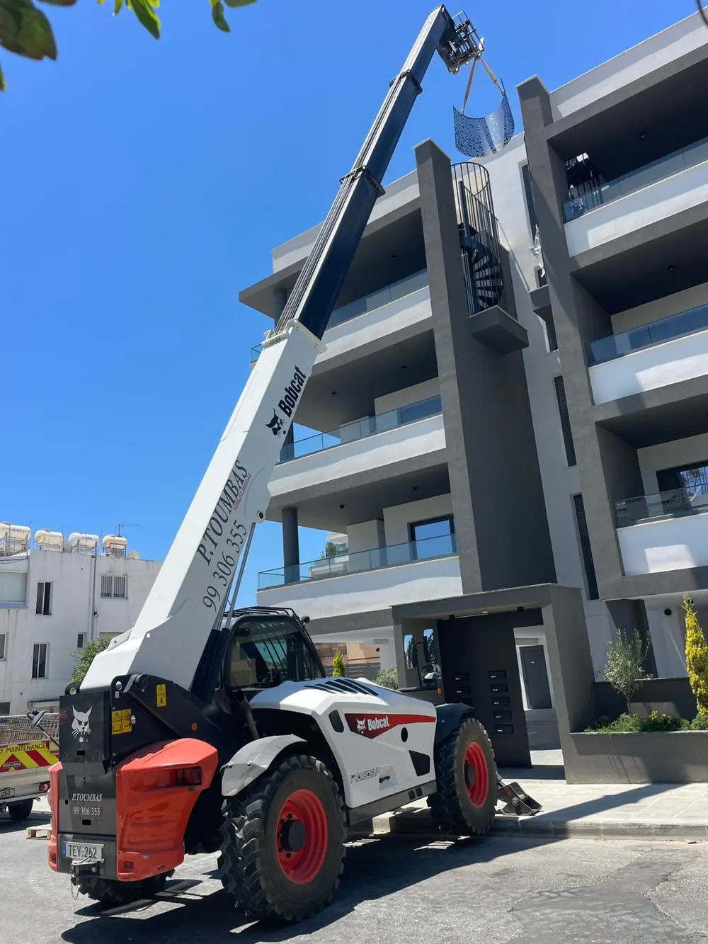 P.TOUMBAS telescopic forklift at an apartment building in Limassol